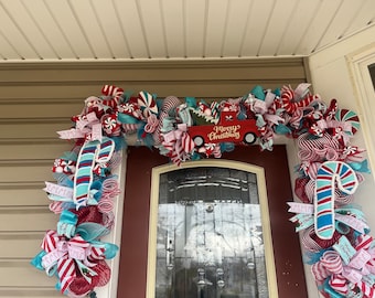 Prelit Christmas garland/ red and blue candy cane garland