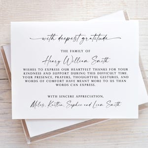 May include: A white card with the text "with deepest gratitude" and a message of thanks from the family of Henry William Smith. The card is in a clear plastic case.