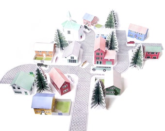 Nordic Village paper models: a set of twelve printable miniature buildings, cars, trees and road sections (PDF download).