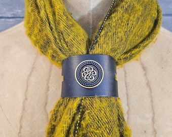 Elegant Gold and Black Infinity knot with side cutouts. The one and only Scarfbuckle