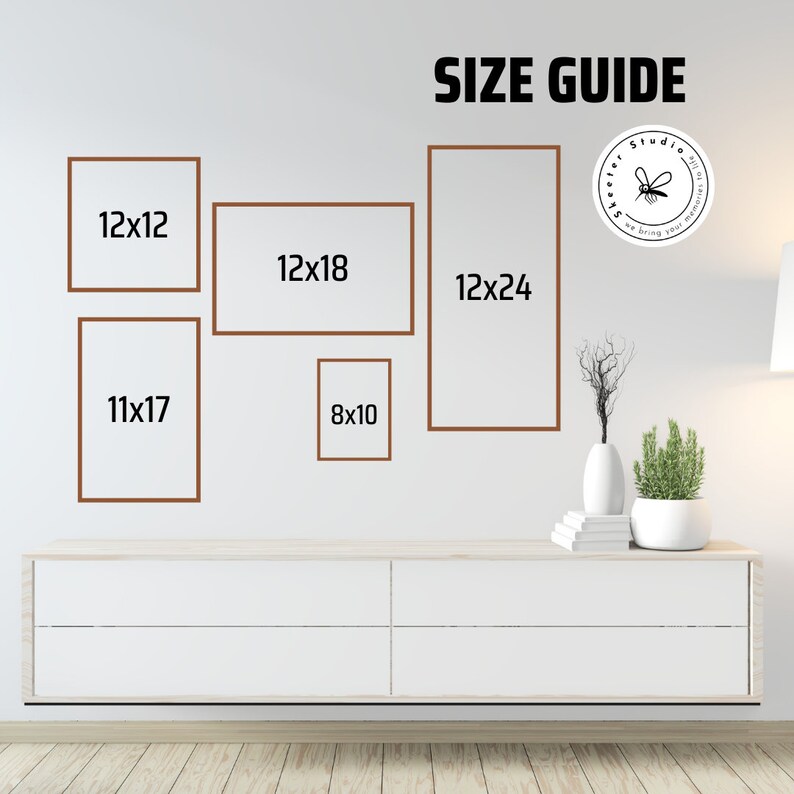 Op de afbeelding: Een maattabel voor ingelijste prints, met verschillende formaten lijsten met afmetingen in inches. De lijsten zijn bruin en worden weergegeven op een witte muur. De tekst "SIZE GUIDE" staat bovenaan de afbeelding.