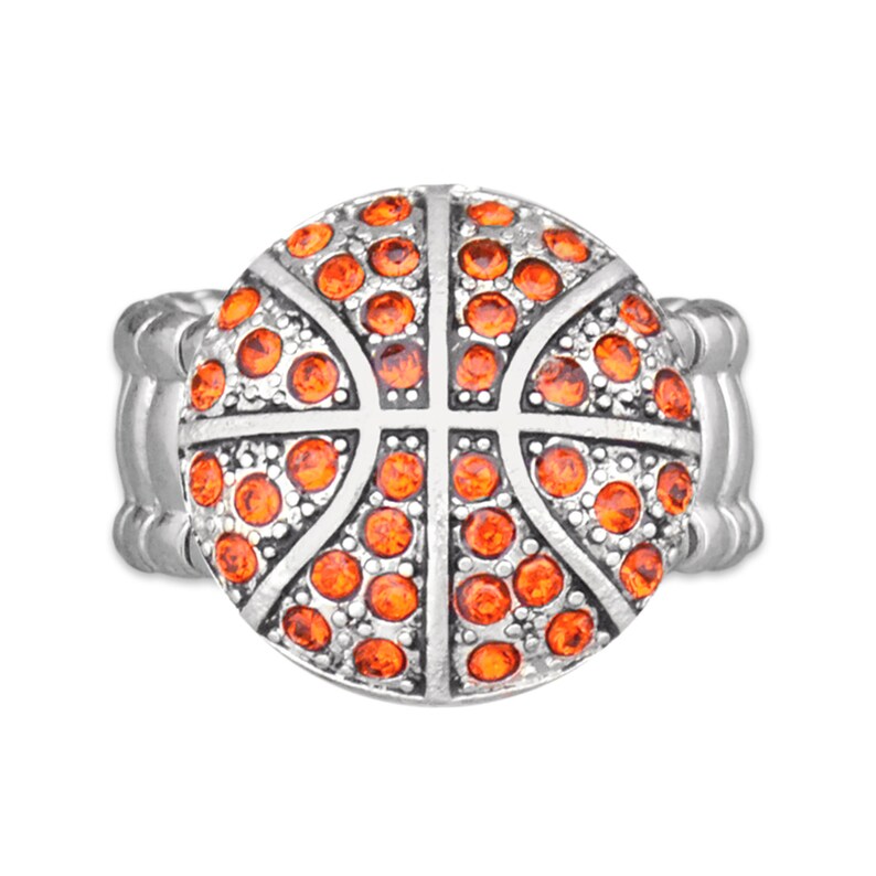May include: A silver ring with an orange basketball design. The basketball is made of rhinestones.