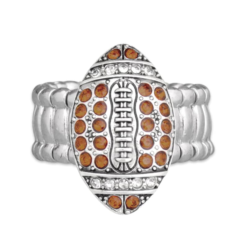 May include: A silver ring with a football design. The football is decorated with brown and clear rhinestones.