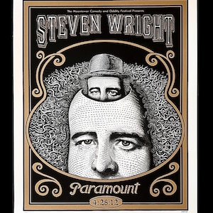 May include: A black and gold poster for Steven Wright at the Paramount theater. The poster features a detailed illustration of Wright's face with a smaller image of him wearing a hat inside his head. The date 4/28/12 is displayed.