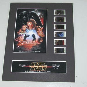 May include: A movie poster for Star Wars Episode III: Revenge of the Sith. The poster features the main characters from the movie, including Anakin Skywalker, Obi-Wan Kenobi, and Darth Vader. The text on the poster reads "Star Wars Episode III: Revenge of the Sith" and "U.S. Release - May 19, 2005".
