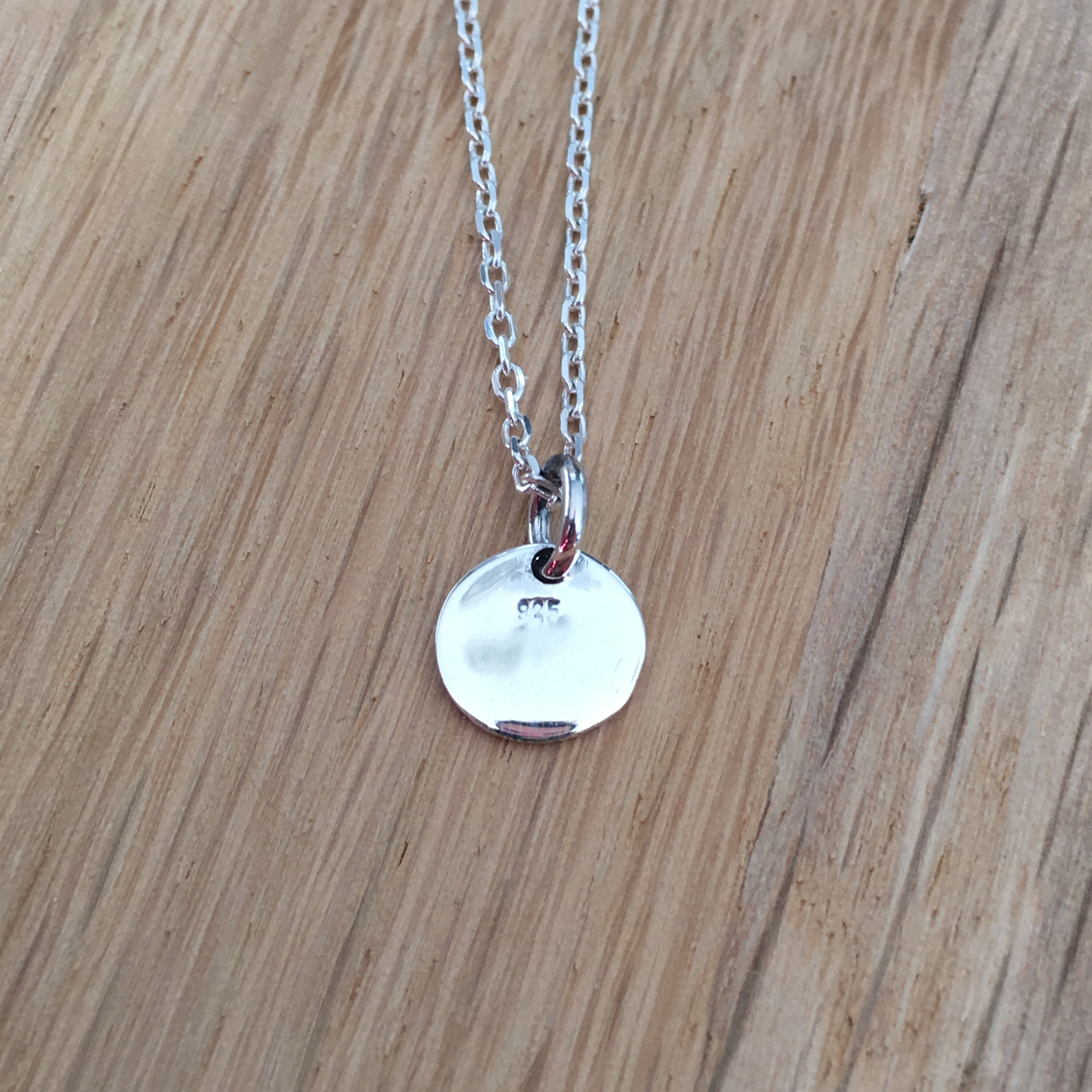médaille lettre or