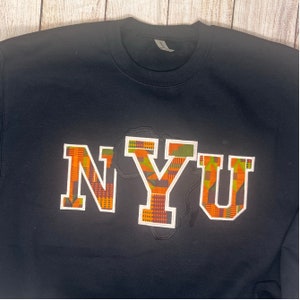 Sudadera Kente NYU