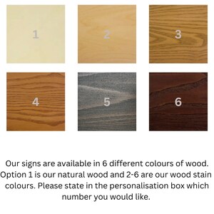 May include: Six wood samples numbered 1 through 6. Option 1 is natural wood. Options 2 through 6 are wood stains in various colors.