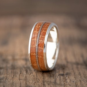 Genuine Whiskey barrel wood ring with Guitar String Inlay | Mens and Women Sterling Silver & Wood Wedding Band
