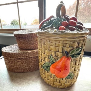 1960s Lefton ceramic canister with basket weave, and fruit detailing