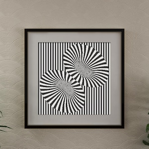 Puede incluir: Una impresión de arte abstracto en blanco y negro en un marco negro. La impresión presenta dos círculos superpuestos con un patrón radiante y un fondo a rayas.