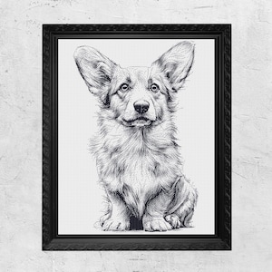 May include: Black framed art print of a Corgi dog. The artwork is a detailed pointillism style illustration in black and white. The dog is sitting and facing forward, with its large ears perked up.