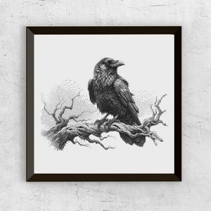 May include: Black and white art print of a raven perched on a tree branch. The raven is detailed with a stippling technique, creating a textured appearance. The artwork is framed in a black square frame, set against a white background.