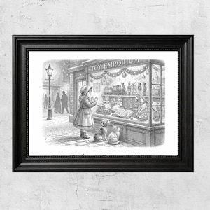 Könnte beinhalten: Gerahmter Schwarz-Weiß-Druck einer Vintage-Illustration. Ein junges Mädchen betrachtet ein Spielzeugladenfenster, begleitet von einem Hund und einer Katze. Das Geschäft trägt die Aufschrift "TOY EMPORIUM" und ist mit Girlanden geschmückt.