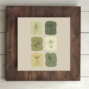 May include: A framed cross-stitch design featuring six stick figures in various poses, each within a colored square. The squares alternate between green and yellow.