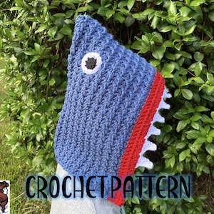 May include: A blue crochet shark hat with a white and black eye, red accents, and white teeth. The text "CROCHET PATTERN" is displayed in black and white.
