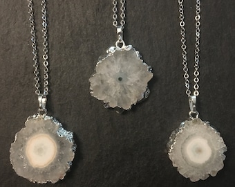 Solar quartz necklace in silver. Quartz slice necklace. White crystal slice.