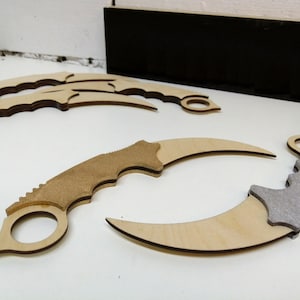 Laser Cut Karambit Knife.  Laser cut files SVG DXF CDR vector plans, files Instant download, cnc pattern, cnc cut, laser cut.  139