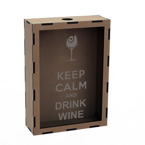 May include: A brown cardboard box with a cutout window. The box has a black border and the text "Keep Calm and Drink Wine" printed on it. There is a wine glass icon above the text.