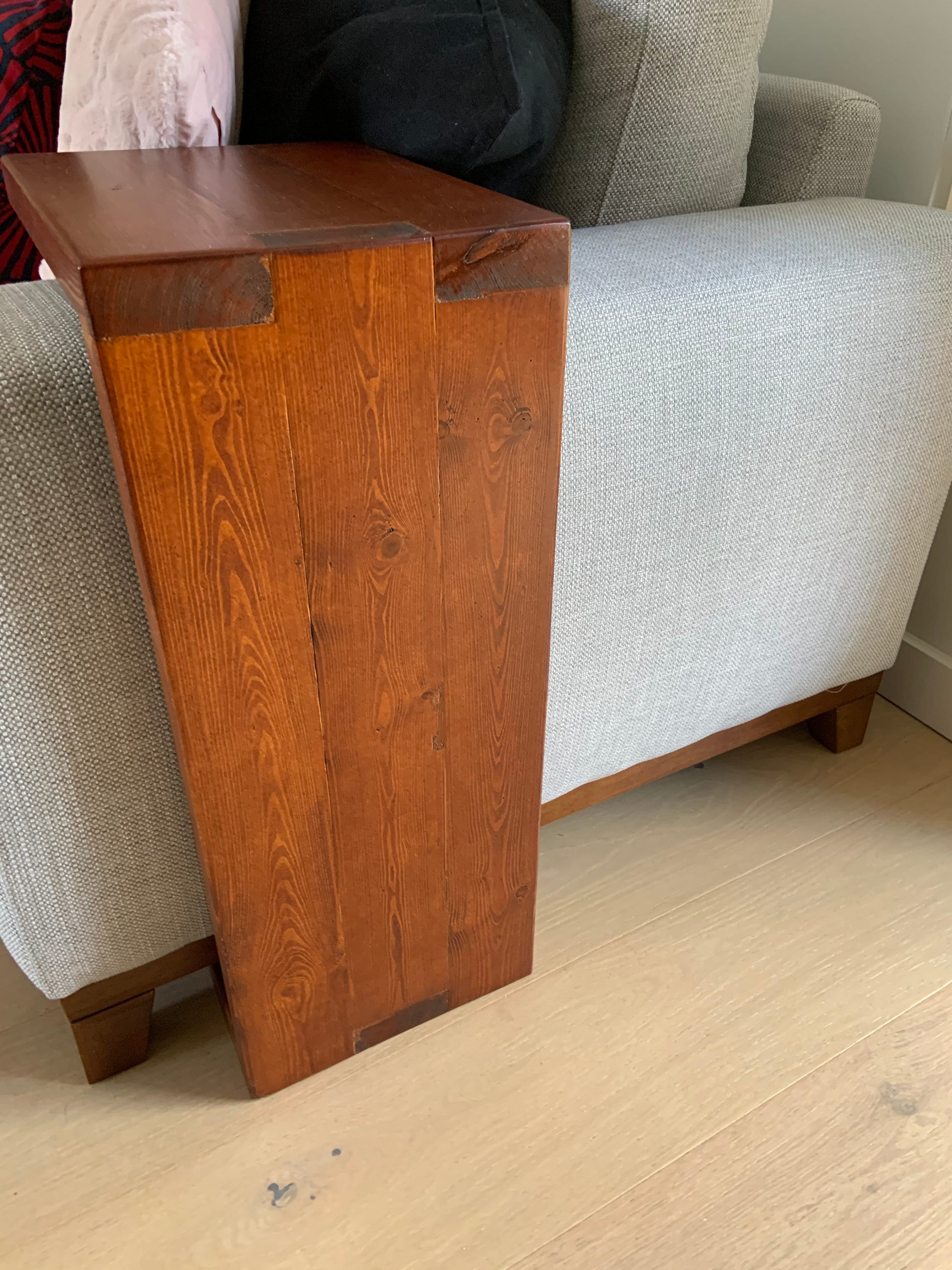 Table that goes over 2024 arm of couch