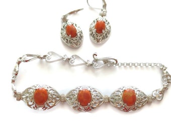 Mohave Orange Turquoise Bracelet (6.50-8.00) and Lever Back Earrings in Platinum Bond Brass and Stainless Steel 8.85 ctw.
