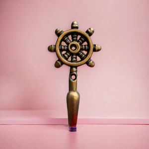 Ship wheel brass wall hooks. Perfect for makeovers,bathroom towel hooks, coat hooks, coat racks.  Single wall hooks. 30+ designs, inc screws