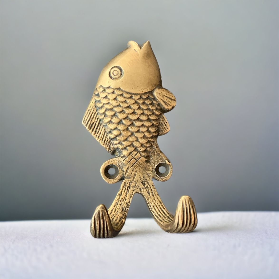 Brass wall fish design hooks. Perfect for makeovers, bathroom towel hooks, coat hooks. Single wall hooks. Door hooks. 30+ designs inc screws