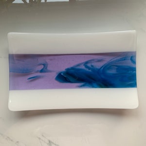 Medium Fused Glass Platter colors are purple, blue and green with white trim