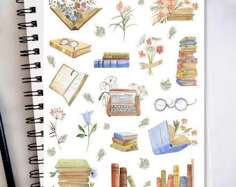 May include: A sheet of stickers featuring illustrations of books, flowers, glasses, and a typewriter. The stickers are white with a light blue background and have the text "BOOK LOVER" at the top.