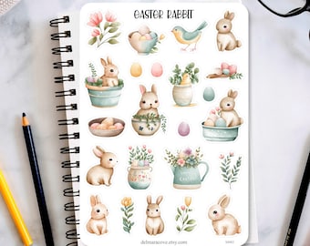 May include: A sheet of Easter-themed stickers featuring bunnies, eggs, flowers, and a bird. The stickers are on a white background with the words "Easter Rabbit" at the top.