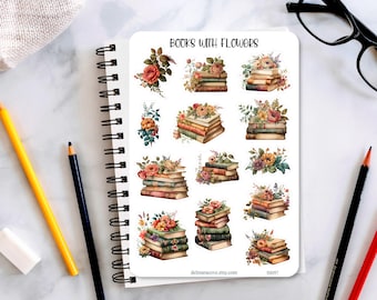 May include: A sheet of 12 colorful stickers featuring stacks of books with flowers. The stickers are perfect for decorating planners, journals, and laptops. The text on the sheet reads "Books with Flowers".