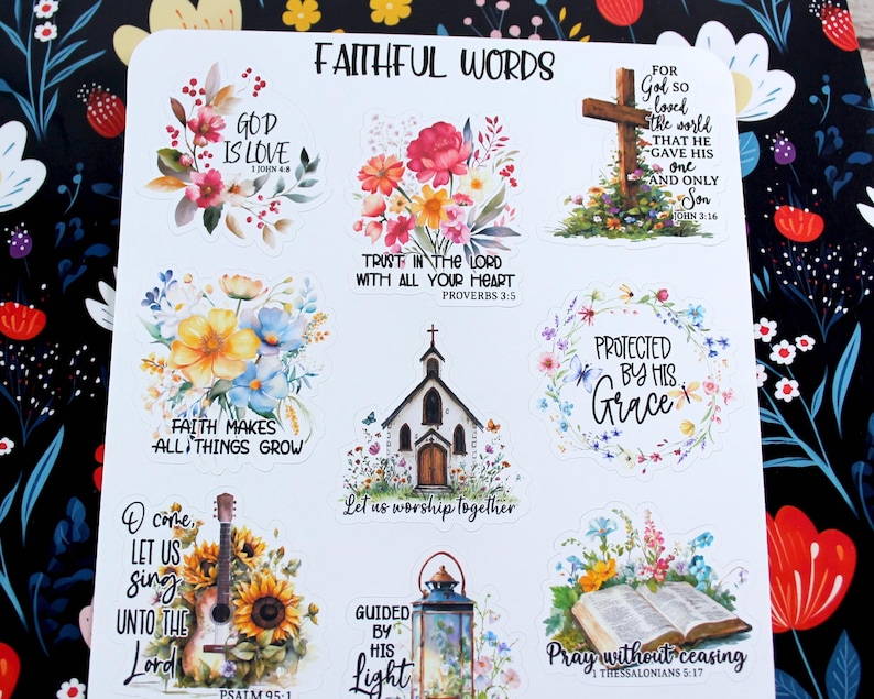May include: A sheet of stickers with floral designs and religious quotes. The stickers feature phrases like "God is Love," "Trust in the Lord," and "Protected by His Grace." Images include a cross, church, and open book.