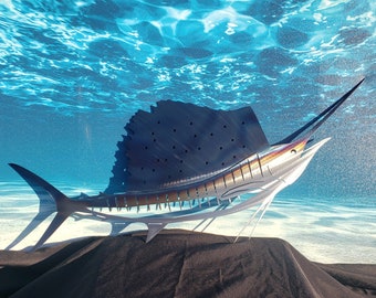 Puede incluir: Una escultura de metal plateado y azul de un pez vela, con un fondo negro y un cielo azul arriba. El pez vela está posicionado como si estuviera saltando fuera del agua.