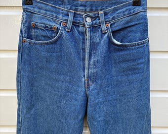 Vintage 90s: Levi's 501 denim jeans - light blue  - made in USA (27x34)