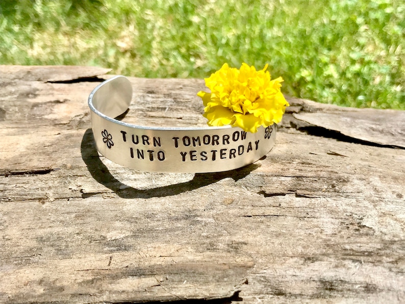 Turn Tomorrow Into Yesterday Adjustable Aluminum Bangle