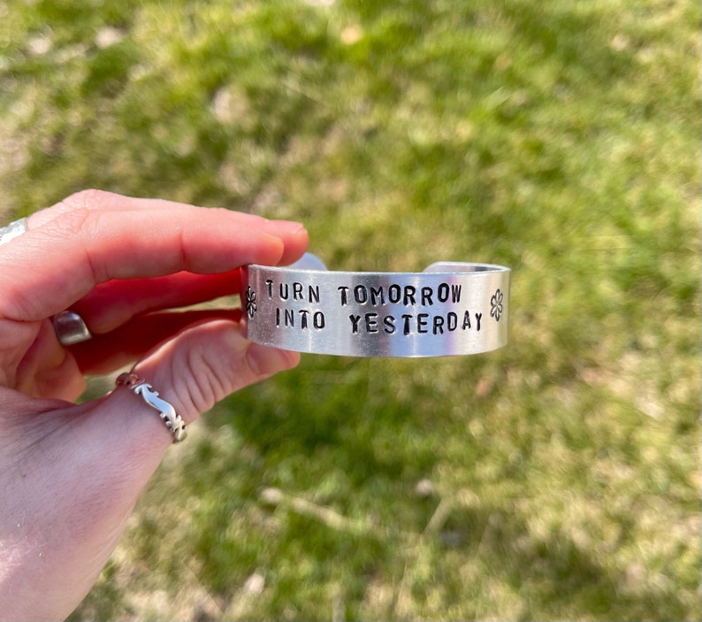 Turn Tomorrow Into Yesterday Adjustable Aluminum Bangle