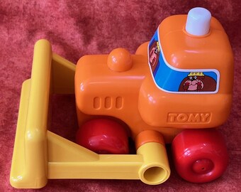 Vintage Tomy Bulldozer Toy: Action Blade, Push Along