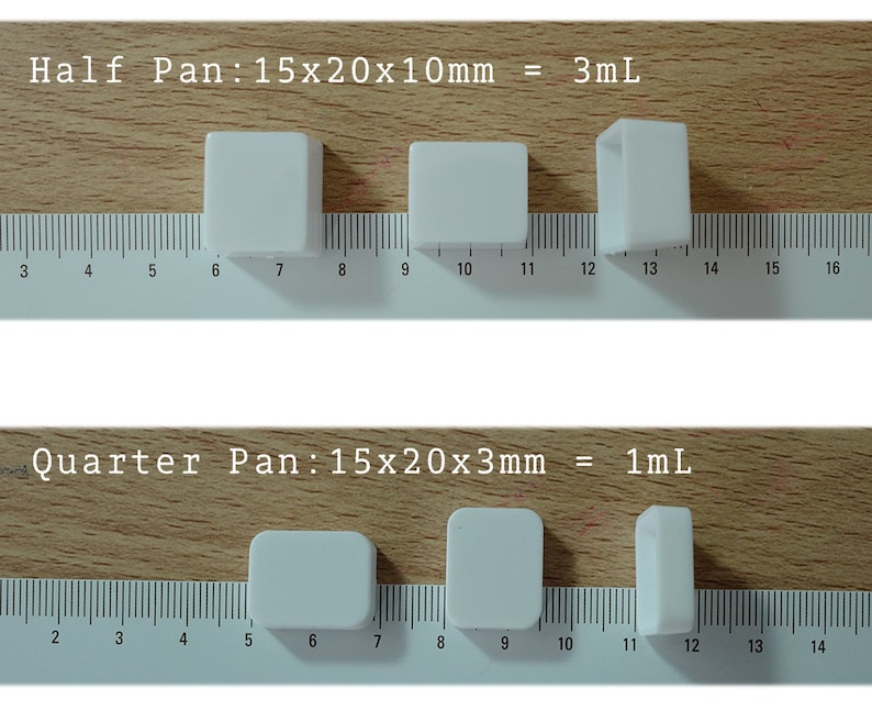 May include: Three white ceramic baking pans of different sizes. The largest pan is labeled "Half Pan: 15x20x10mm = 3mL". The medium pan is unlabeled. The smallest pan is labeled "Quarter Pan: 15x20x3mm = 1mL".