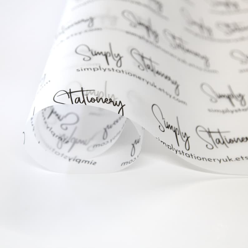 May include: White tissue paper with a repeating pattern of the text "Simply Stationery" and the website address "simplystationeryuk.etsy.com".