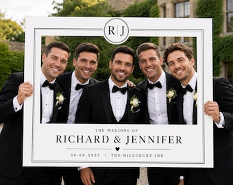 May include: A white rectangular photo booth frame featuring a black border and the text "THE WEDDING OF RICHARD & JENNIFER", the date "08.08.2027", "THE HILLCOURT INN", and a circular monogram with the letters "R | J" at the top center.
