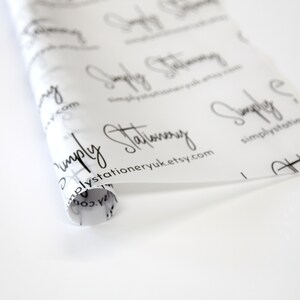 May include: White tissue paper with a repeating pattern of the text "Simply Stationery" and the website address "simplystationeryuk.etsy.com" printed in black.