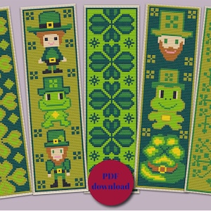 Pode incluir: Cinco padrões de marcador de página de ponto cruz imprimíveis com um trevo verde, um duende e um sapo. Os padrões estão em uma gama de cores verde, branco e dourado. O texto "Download PDF" é visível na imagem.