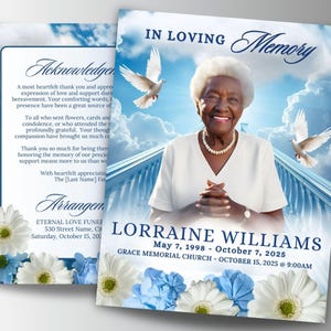 May include: A memorial card with a photo of a smiling woman, white doves, and floral accents. The card includes the text "In Loving Memory" and details of Lorraine Williams' life, including dates and a church location.