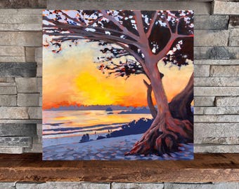 May include: A painting of a tree with thick roots on a beach at sunset. The sky is a vibrant orange and yellow, and the water is a calm blue. The tree is silhouetted against the sunset, and its branches reach out towards the sky.