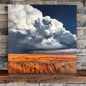May include: A painting of a stormy sky with a large, white cumulus cloud over a field of golden wheat.