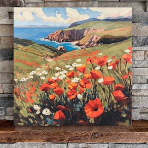 May include: A painting depicting a coastal landscape with a field of red poppies in the foreground. The ocean can be seen in the background, with a rocky coastline and a blue sky with white clouds.