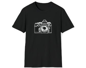 May include: A black t-shirt with a white outline of a camera with an open aperture.
