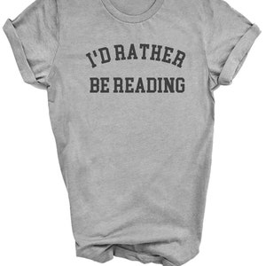 May include: Gray t-shirt with the text "I'd rather be reading" in black.