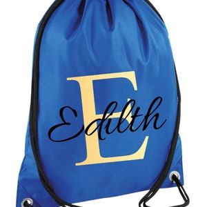 drawstring waterproof bag in royal blue colour, with a gold monogram letter and script name