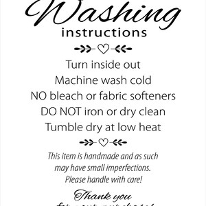 May include: White card with black text providing washing instructions. The text includes "Turn inside out, Machine wash cold, NO bleach or fabric softeners, DO NOT iron or dry clean, Tumble dry at low heat."